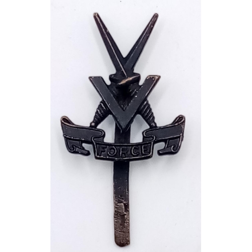 812 - WW2 Middle East Made “V Force” Cap Badge.