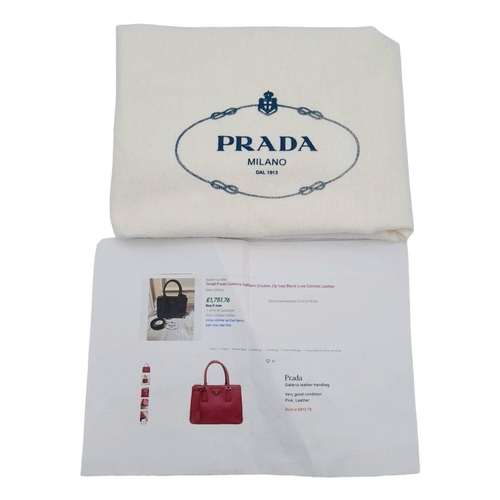 101 - A Prada Saffiano Vernice Galleria Handbag. Pink cross-grain saffiano leather exterior, gold-toned ha... 