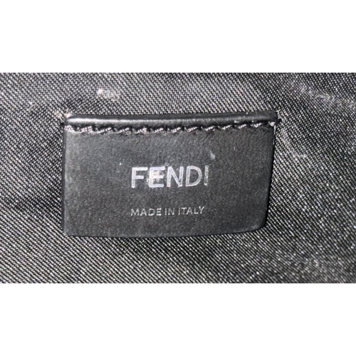 108 - A Fendi Black Monster Backpack. Textile and leather exterior, with two large yellow monster eyes, a ... 