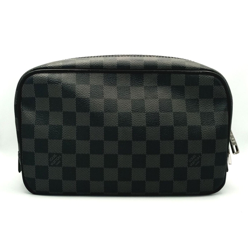 136 - A Louis Vuitton Damier Graphite Toiletry Pouch. Coated canvas exterior with silver-toned hardware an... 