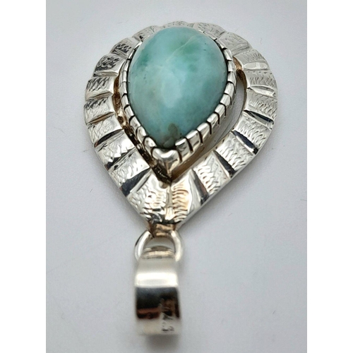 1495 - A Larimar Pendant. Set in 925 Sterling silver. 3cm.