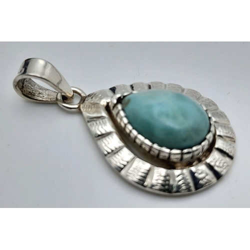 1495 - A Larimar Pendant. Set in 925 Sterling silver. 3cm.