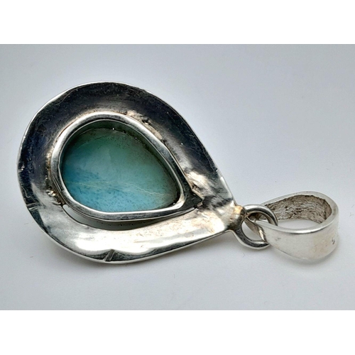 1495 - A Larimar Pendant. Set in 925 Sterling silver. 3cm.