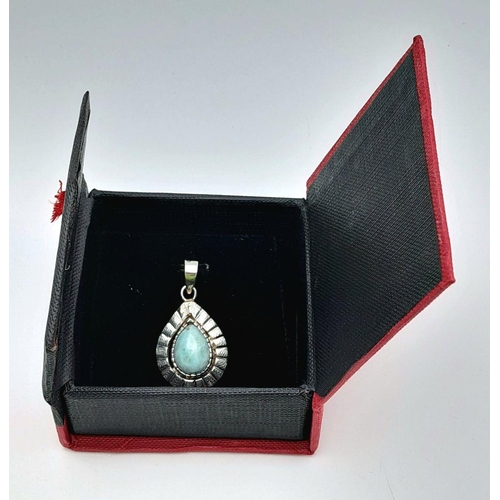 1495 - A Larimar Pendant. Set in 925 Sterling silver. 3cm.