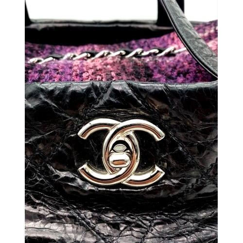 157 - A Chanel Black Portobello Tote Bag. Hand and shoulder straps. Colourful tweed and black textile inte... 