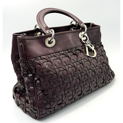 171 - A Christian Dior Woven Lambskin Avenue Small Tote Bag. Woven burgundy leather exterior with silver t... 