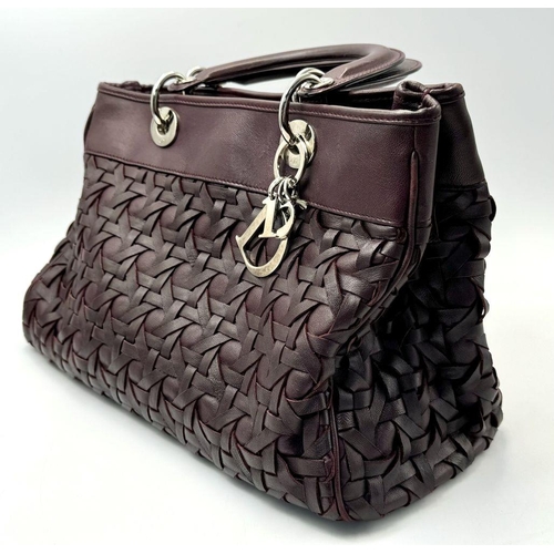 171 - A Christian Dior Woven Lambskin Avenue Small Tote Bag. Woven burgundy leather exterior with silver t... 