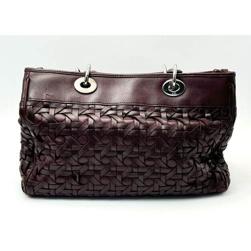 171 - A Christian Dior Woven Lambskin Avenue Small Tote Bag. Woven burgundy leather exterior with silver t... 