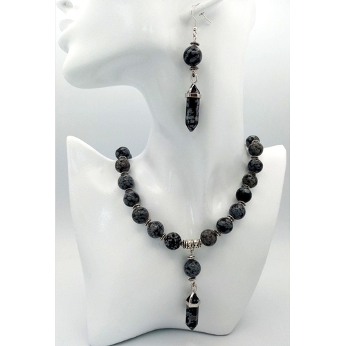 188 - A very desirable “Snowflake Obsidian” necklace and earrings set with pendant obelisks. Necklace leng... 