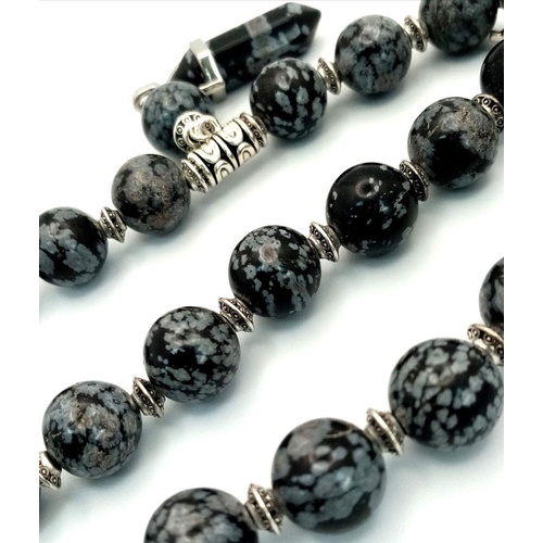 188 - A very desirable “Snowflake Obsidian” necklace and earrings set with pendant obelisks. Necklace leng... 