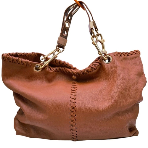 192 - A Jimmy Choo Large Brown Leather Tote Bag. Chunky gold tone hardware. A very spacious golden textile... 