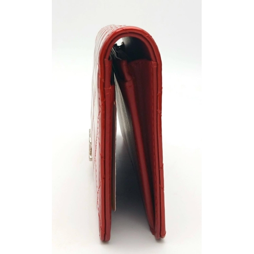 207 - A Chanel Patent Red Leather Clutch Purse/Wallet. A perfect diamond formation with the classic Chanel... 