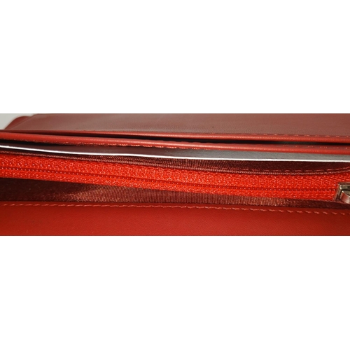 207 - A Chanel Patent Red Leather Clutch Purse/Wallet. A perfect diamond formation with the classic Chanel... 