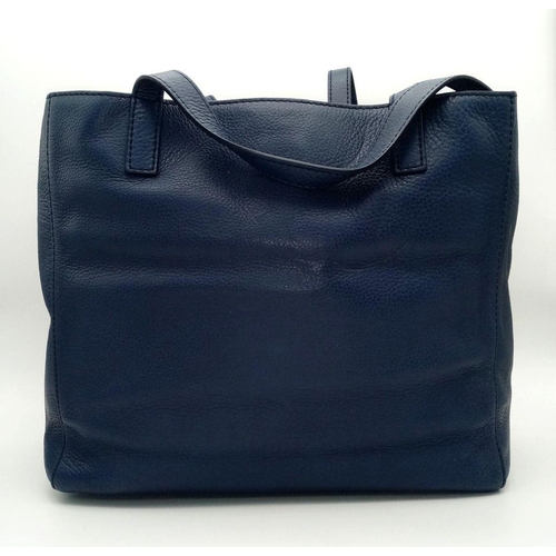 214 - A Mulberry Blue Tessie Leather Tote Bag. Blue leather exterior with silver-toned hardware and dual l... 