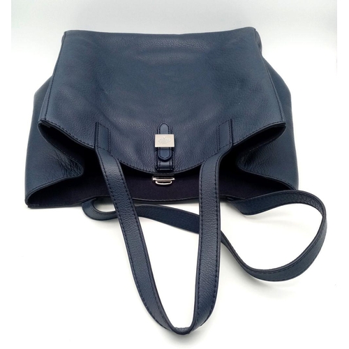 214 - A Mulberry Blue Tessie Leather Tote Bag. Blue leather exterior with silver-toned hardware and dual l... 