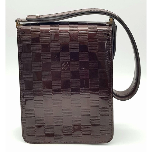 242 - A Louis Vuitton Brooklyn Leather Shoulder bag. Burgundy leather checked exterior. Silver tone hardwa... 