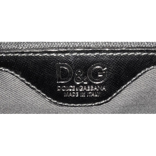 277 - A Dolce & Gabbana Black Patent Leather Bag. Leather exterior with silver-tone hardware, protective m... 