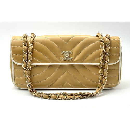 32 - A Beautiful Chanel Caramel Patent Leather Shoulder Bag. Gold tone hardware. Textile interior. Comes ... 