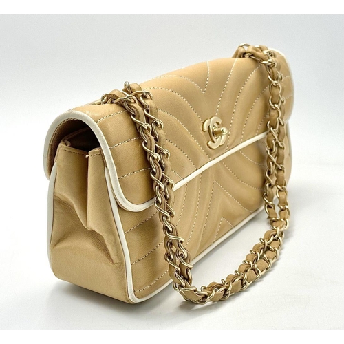 32 - A Beautiful Chanel Caramel Patent Leather Shoulder Bag. Gold tone hardware. Textile interior. Comes ... 