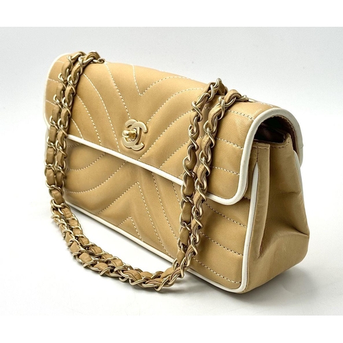 32 - A Beautiful Chanel Caramel Patent Leather Shoulder Bag. Gold tone hardware. Textile interior. Comes ... 