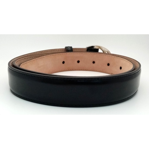 340 - A Gucci Black Leather Belt with Dust Cover. 111cm total length. In good condition but please see pho... 