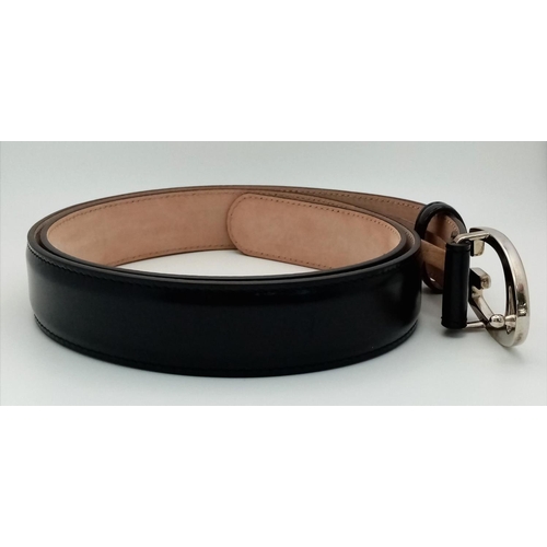 340 - A Gucci Black Leather Belt with Dust Cover. 111cm total length. In good condition but please see pho... 