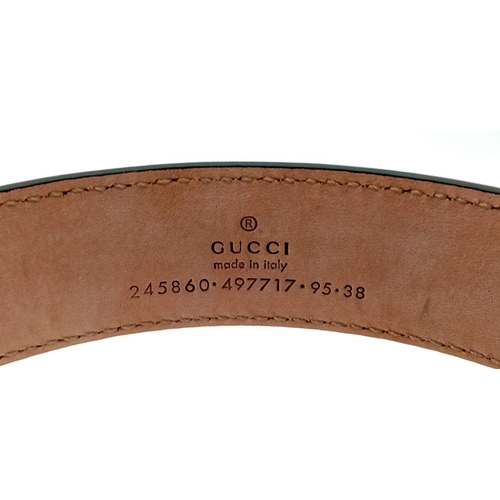 340 - A Gucci Black Leather Belt with Dust Cover. 111cm total length. In good condition but please see pho... 