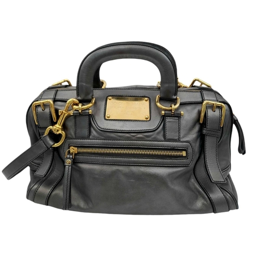 347 - A Dolce and Gabbana Via San Damiano Hand/Shoulder Bag. Metallic grey leather exterior. Gold tone har... 