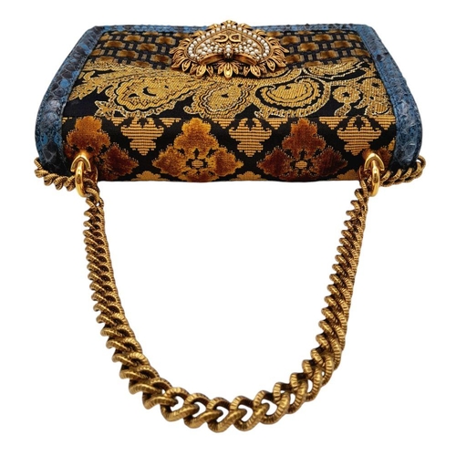 39 - A Dolce and Gabbana Patchwork Devotion Crossbody/Shoulder Bag. This snakeskin bag has multicolour ex... 