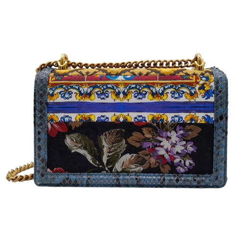 39 - A Dolce and Gabbana Patchwork Devotion Crossbody/Shoulder Bag. This snakeskin bag has multicolour ex... 