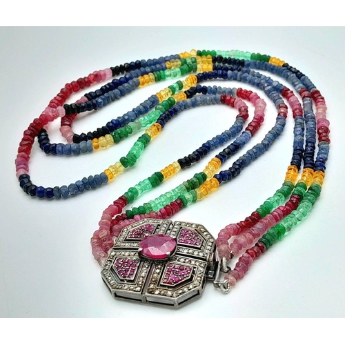 398 - A Three Row Multi-Sapphire Beaded Necklace. With a Ruby & Diamond encrusted clasp. Set in 925 Sterli... 