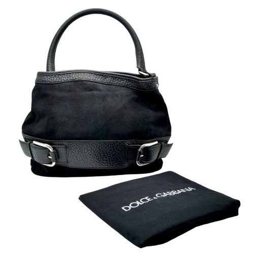 400 - A Dolce and Gabbana Black Suede and Leather Handbag. Exterior belt form with silver tone hardware. S... 