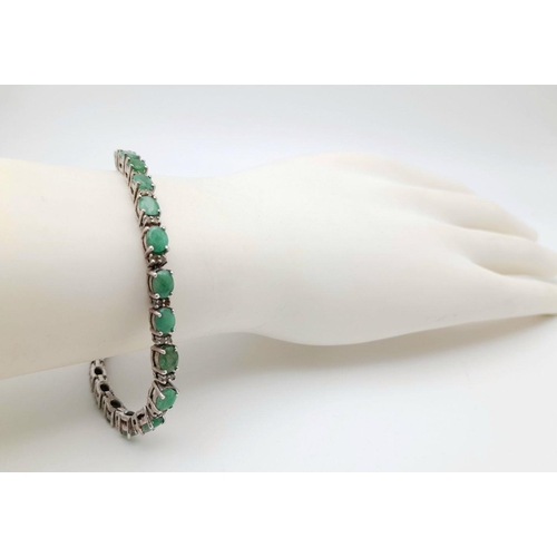 405 - A Green Onyx Tennis Bracelet with Rose cut Diamond Accents. Set in 925 Sterling silver. 18cm length.... 