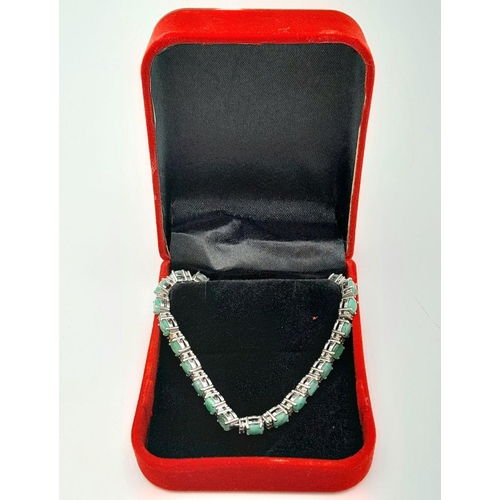 405 - A Green Onyx Tennis Bracelet with Rose cut Diamond Accents. Set in 925 Sterling silver. 18cm length.... 