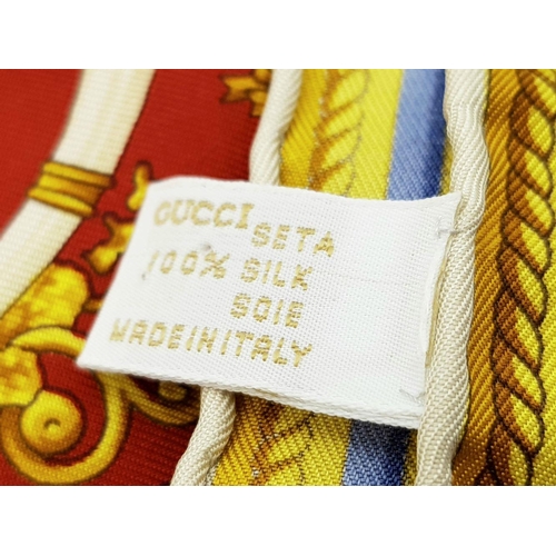 414 - A Colourful Gucci Silk Scarf. 90cm x 90cm. Ref: 019336