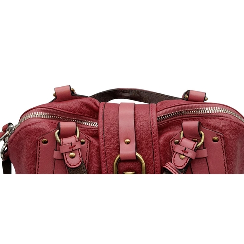 430 - A Chloe Fuchsia Leather Charm Detail Tote Bag. Pink leather exterior with gold-tone hardware and a d... 