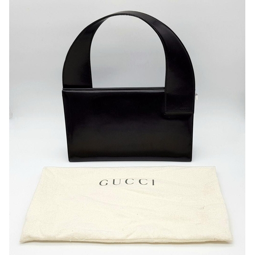 437 - A Gucci Brown Leather Shoulder Bag. Leather exterior with silver-tone hardware and a magnetic snap c... 