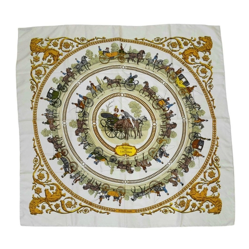 44 - A Hermes Silk Scarf with Horse and Carriage Pattern. 92cm x 92cm. Ref: 019339