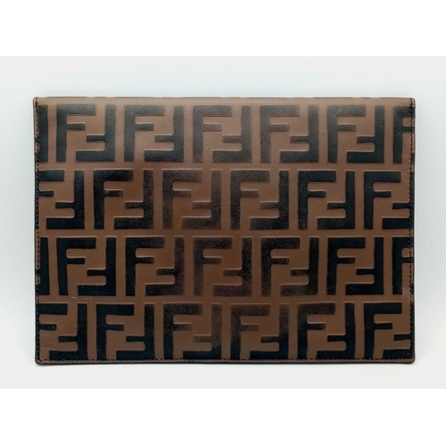 445 - A Fendi Zucca Monogram Envelope Clutch Bag. Brown and black coated canvas exterior with gold-toned h... 