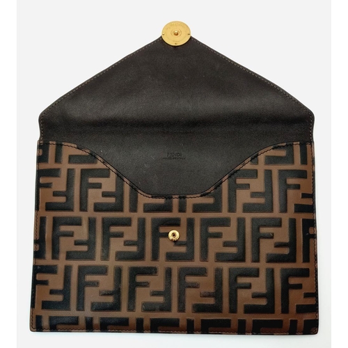 445 - A Fendi Zucca Monogram Envelope Clutch Bag. Brown and black coated canvas exterior with gold-toned h... 