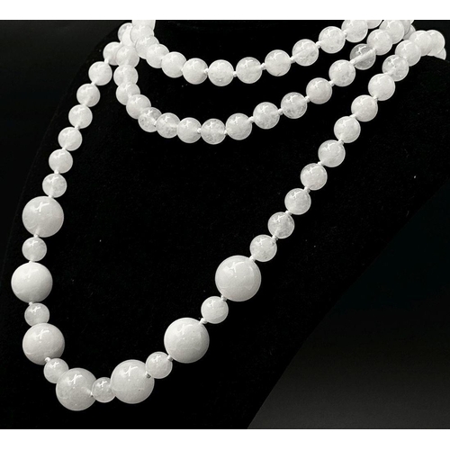 491 - A White Jade Graduated Rope Length Necklace. 6mm - 14mm beads. 120cm necklace length.