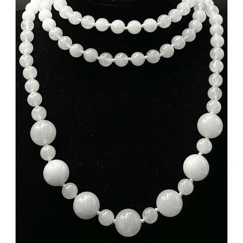 491 - A White Jade Graduated Rope Length Necklace. 6mm - 14mm beads. 120cm necklace length.