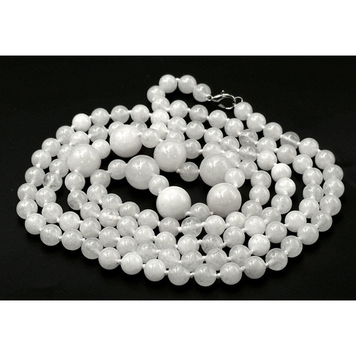 491 - A White Jade Graduated Rope Length Necklace. 6mm - 14mm beads. 120cm necklace length.