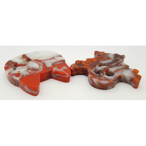 548 - Two Ghoulish Hand-Carved Red and White Coloured Agate Figures. Cheshire cat and ghost!  8 x 8cm.