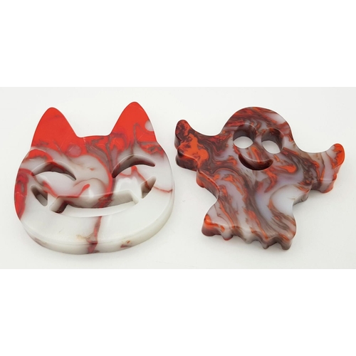 548 - Two Ghoulish Hand-Carved Red and White Coloured Agate Figures. Cheshire cat and ghost!  8 x 8cm.