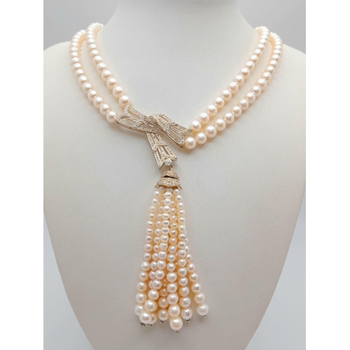 55 - A stunning, vintage, sterling silver necklace with two rows of beautiful, marine, round white pearls... 