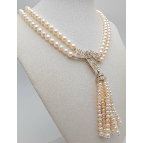 55 - A stunning, vintage, sterling silver necklace with two rows of beautiful, marine, round white pearls... 