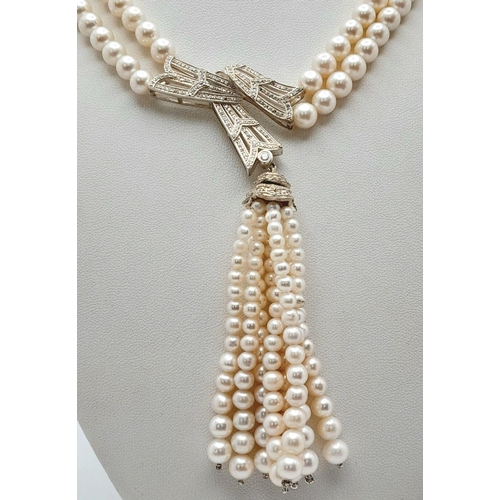 55 - A stunning, vintage, sterling silver necklace with two rows of beautiful, marine, round white pearls... 