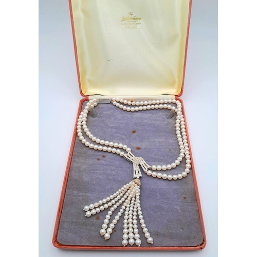 55 - A stunning, vintage, sterling silver necklace with two rows of beautiful, marine, round white pearls... 