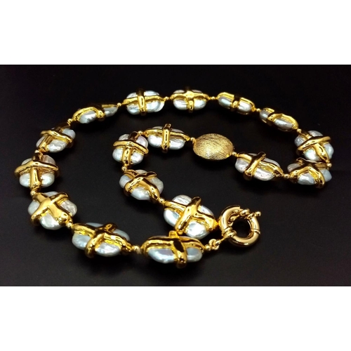 69 - A very unusual 22 yellow gold-plated pearl necklace and bracelet set. Large (average 18 x 14 mm) cul... 